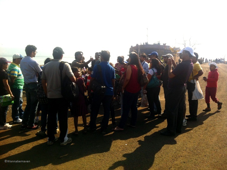 Sewri Jetty Flamingos - A guide and a group of visitors who came to view flamingo's