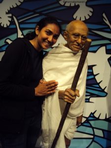 thats me with Mahatma Gandhi at the Madame Tussauds in London - celebrity wax museum